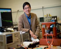 Associate professor of electrical and computer engineering Nian Sun works on the interface of radio-frequency devices and the magnetic field. (Photo: Brooks Canaday / Northeastern University)