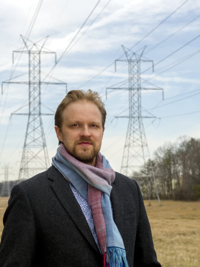 NASA scientist Antti Pulkkinen is using high-voltage power transmission lines as a very large antenna to measure a space weather-related phenomenon. (Photo: NASA Goddard/Bill Hrybyk)